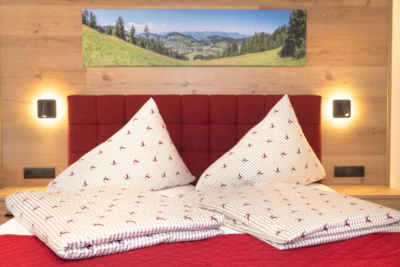 Hotel Schneeberger Niederau Esterno foto